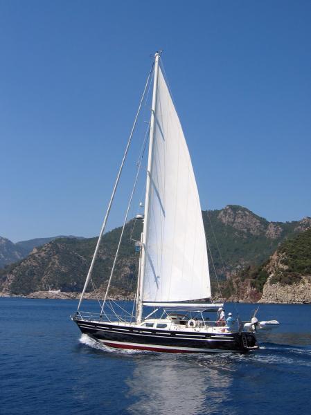 sailing-boat-docked-in-portsmo-sailing-boat-2735335-5246711_dia.jpg